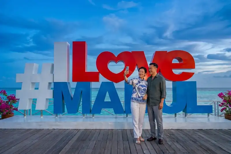 Famous I Love Mabul sign on Mabul Island Kulapuan Island Resort