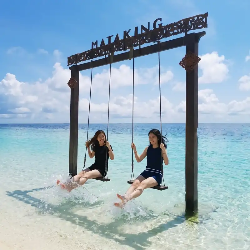 Exploring the white sands of Mataking Island Kulapuan Island Resort